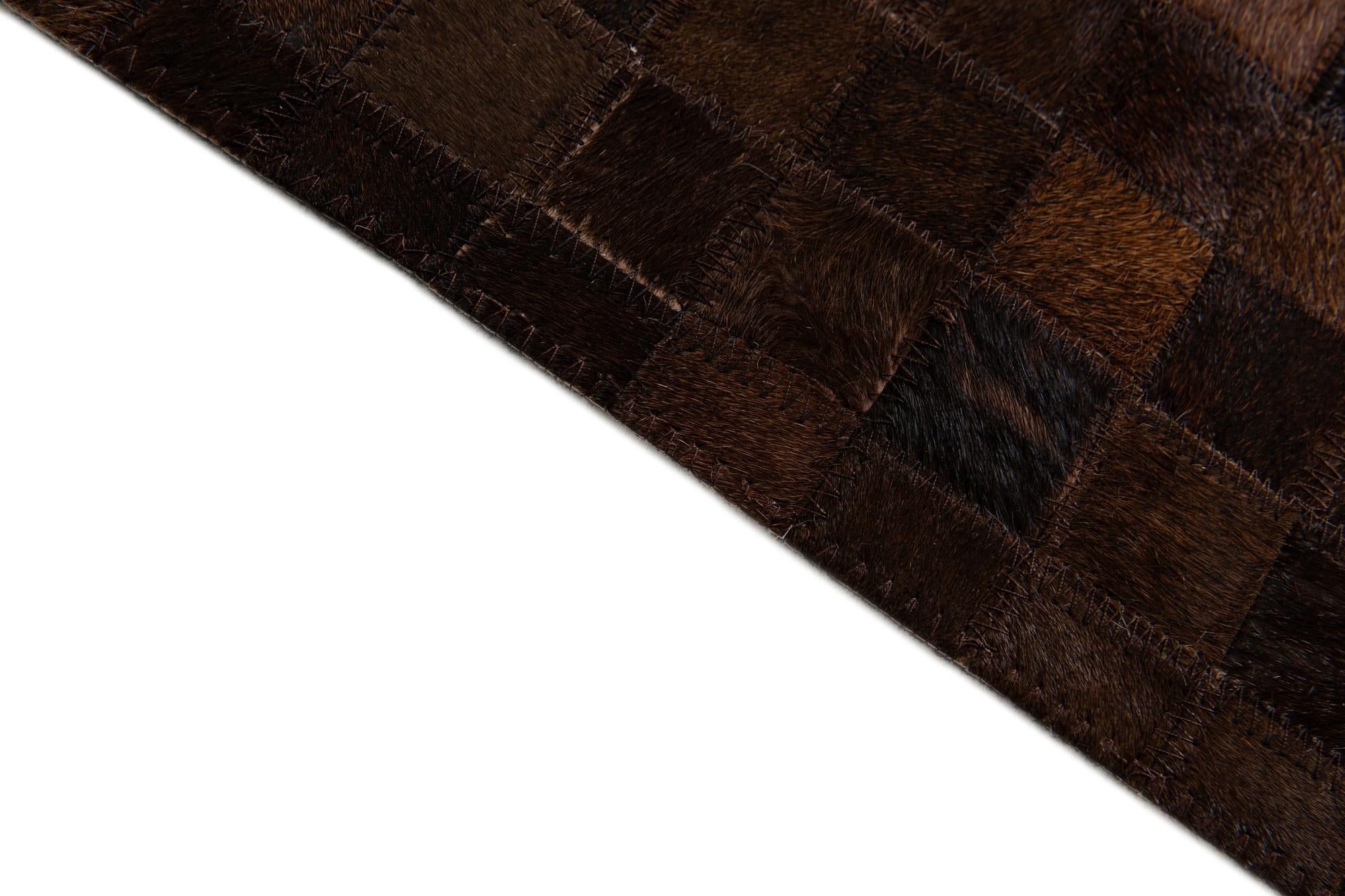 5' x 7' 11 Cowhide Stocks Rug