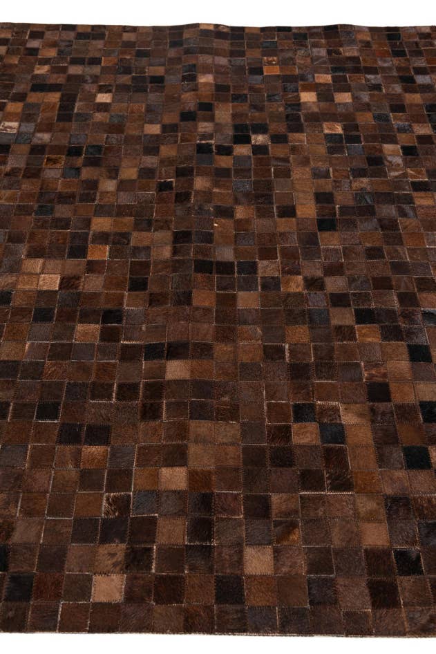 Detail image of 4' 11 x 8' 1 Cowhide Stocks Rug