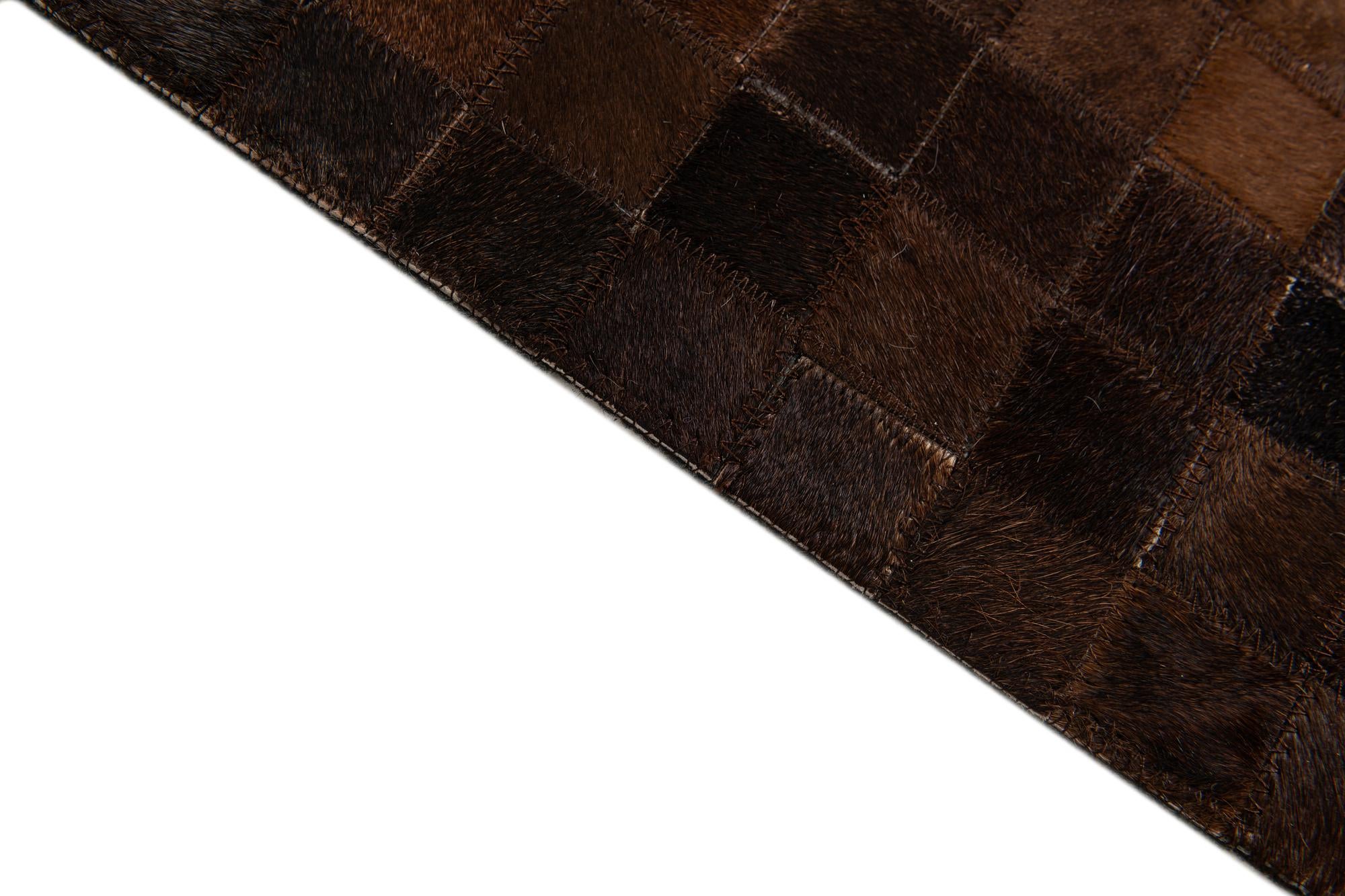 4' 11 x 8' 1 Cowhide Stocks Rug
