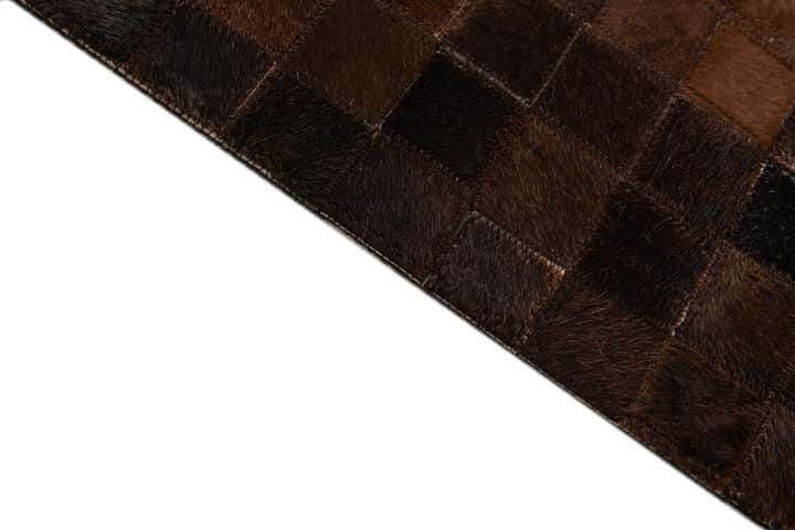 4' 11 x 8' 1 Cowhide Stocks Rug