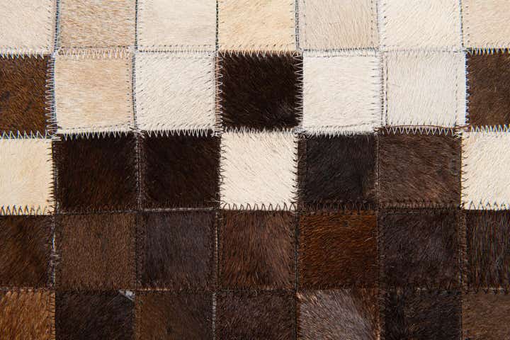4' 11 x 8' 1 Cowhide Stocks Rug