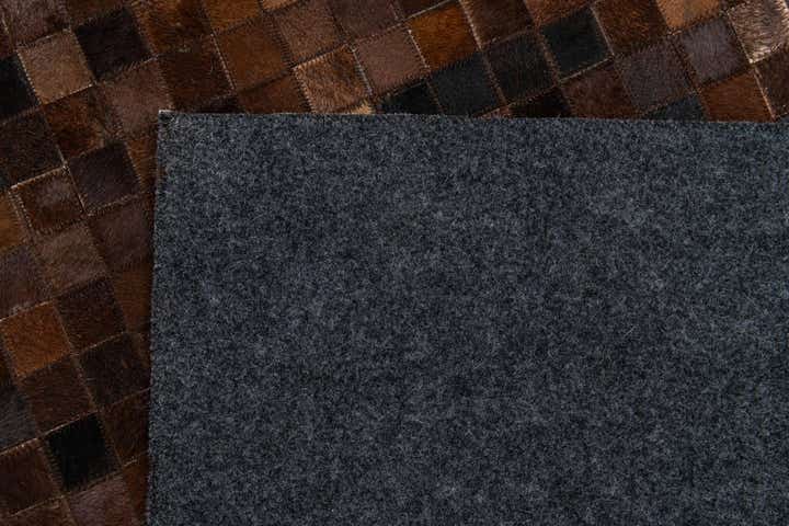 4' 11 x 8' 1 Cowhide Stocks Rug