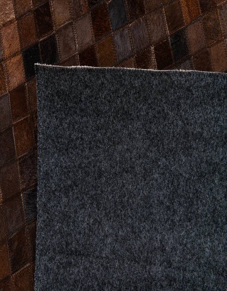 Detail image of 5' 1 x 7' 11 Cowhide Stocks Rug