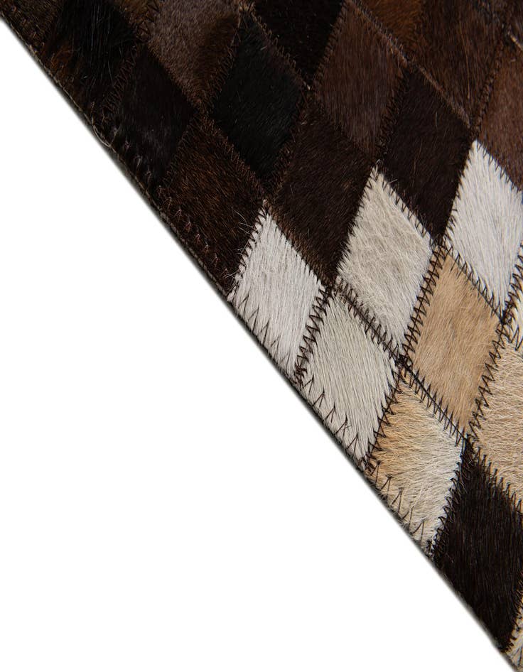 Detail image of 5' 2 x 8' Cowhide Stocks Rug