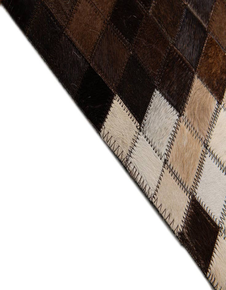 Detail image of 5' 2 x 8' Cowhide Stocks Rug