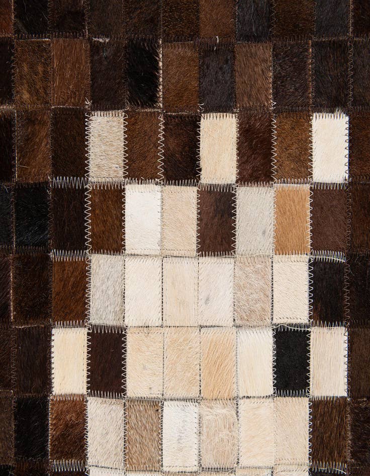 Detail image of 5' 1 x 8' 2 Cowhide Stocks Rug