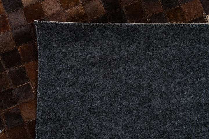 5' 1 x 8' 2 Cowhide Stocks Rug