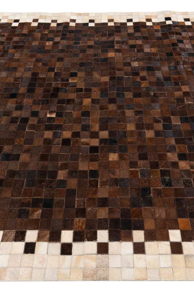 5' 1 x 7' 10 Cowhide Stocks Rug