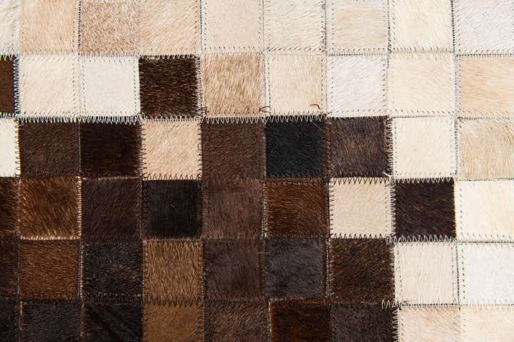 5' 1 x 7' 10 Cowhide Stocks Rug