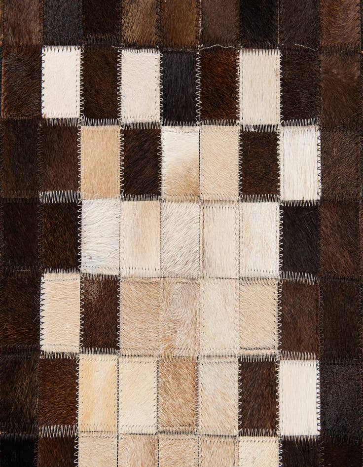 Detail image of 5' 2 x 8' 1 Cowhide Stocks Rug