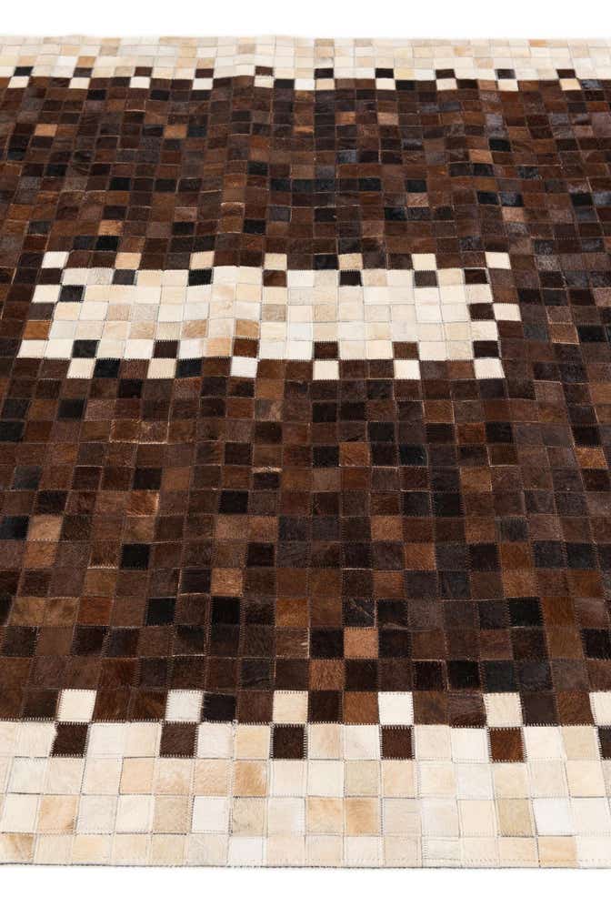5' 2 x 8' 1 Cowhide Stocks Rug