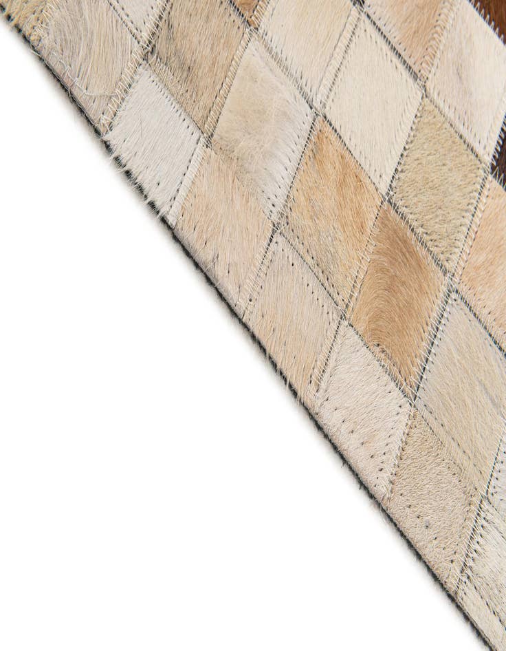 Detail image of 5' 2 x 8' 1 Cowhide Stocks Rug