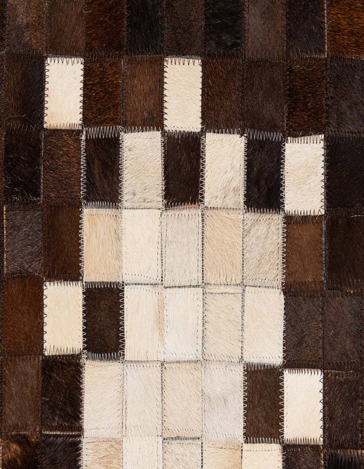 Detail image of 5' 2 x 8' 1 Cowhide Stocks Rug