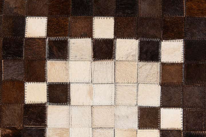 5' 2 x 8' 1 Cowhide Stocks Rug