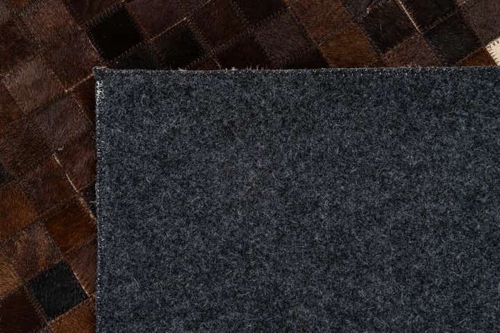 5' 2 x 8' 1 Cowhide Stocks Rug