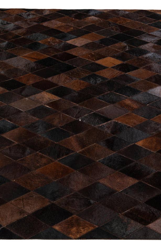 Detail image of 5' 2 x 8' Cowhide Stocks Rug