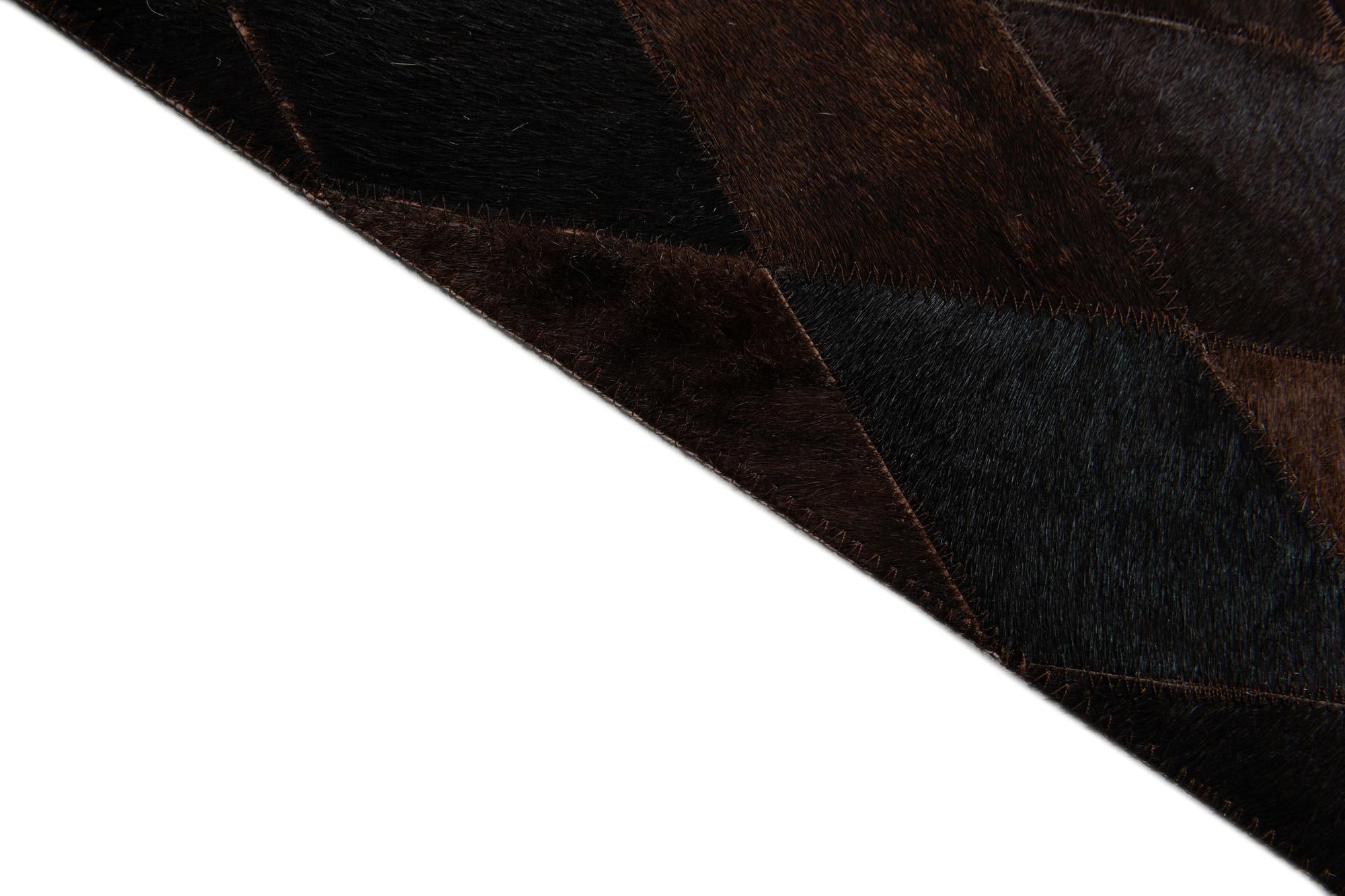 5' 2 x 8' Cowhide Stocks Rug