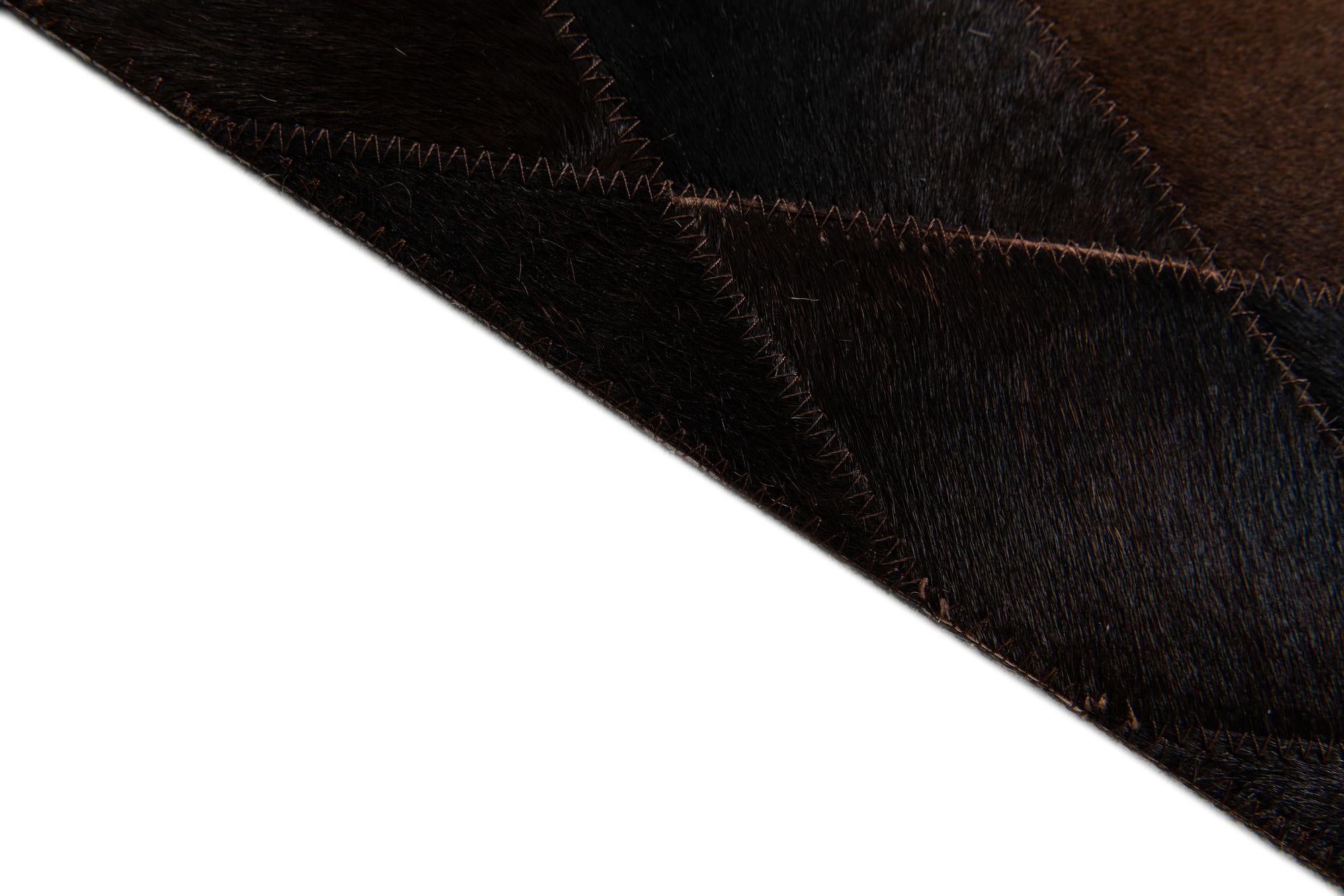 5' 2 x 8' Cowhide Stocks Rug