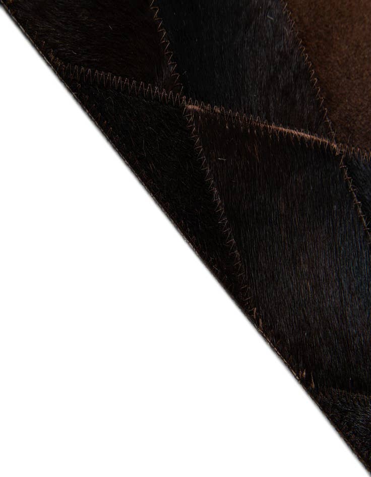 Detail image of 5' 2 x 8' Cowhide Stocks Rug