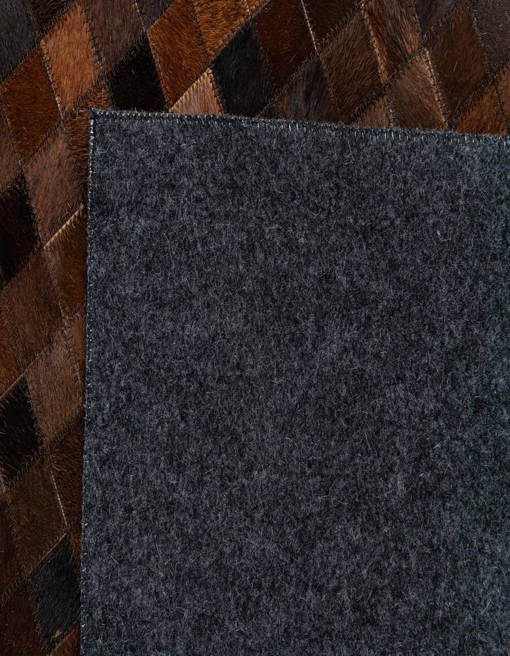 Detail image of 5' 1 x 7' 11 Cowhide Stocks Rug