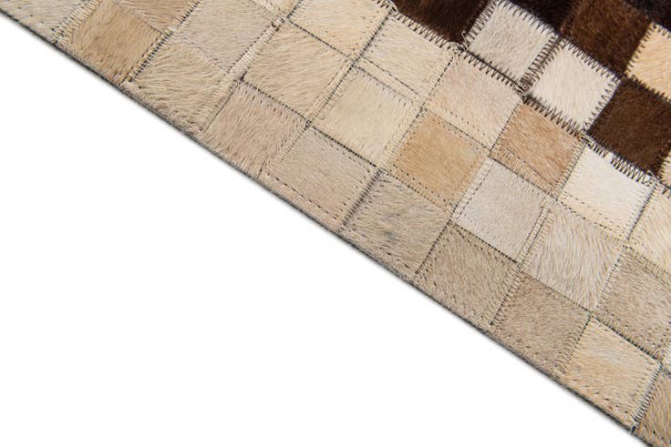 Detail image of 5' 1 x 8' 2 Cowhide Stocks Rug