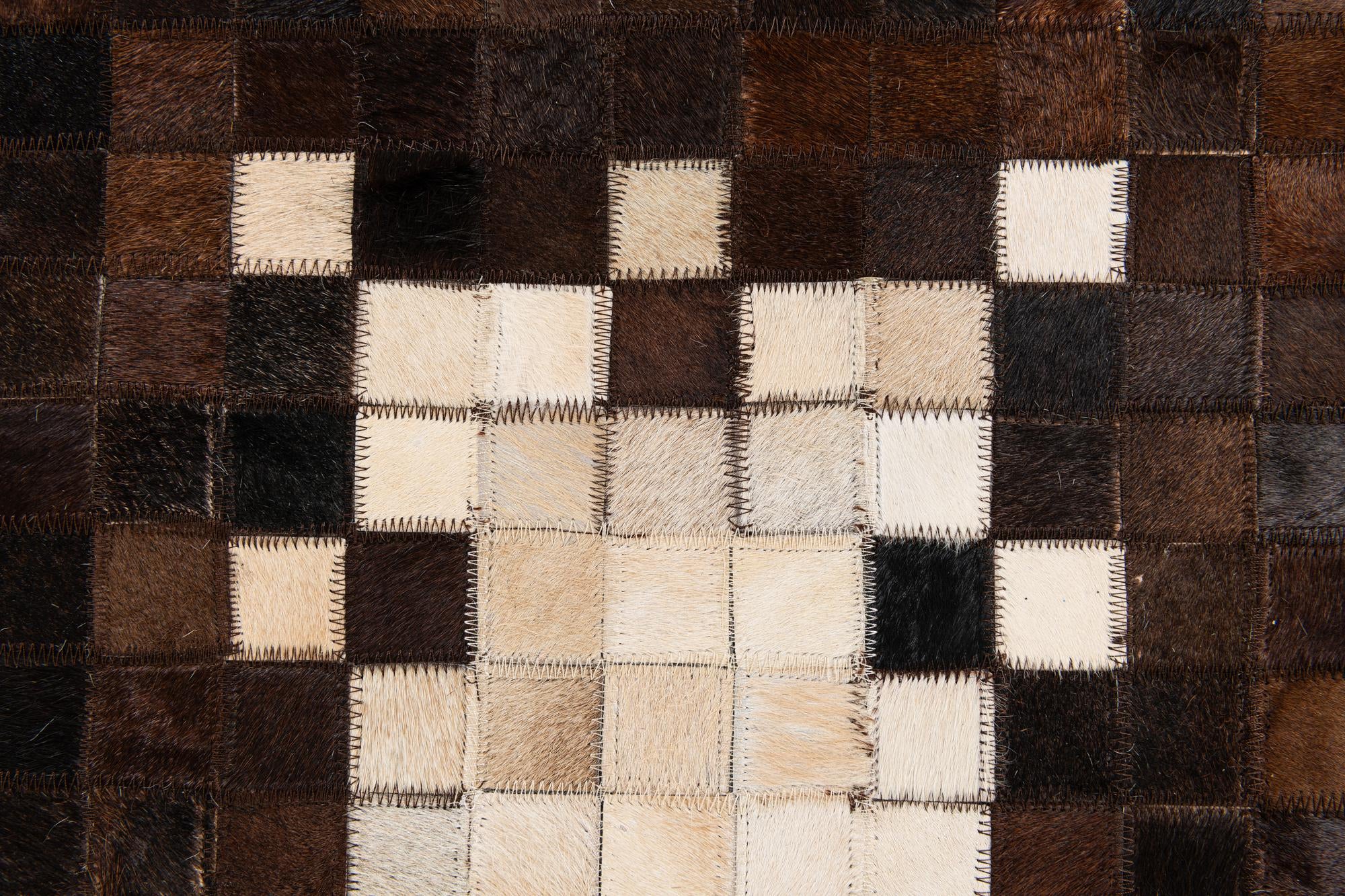 5' 1 x 8' 2 Cowhide Stocks Rug