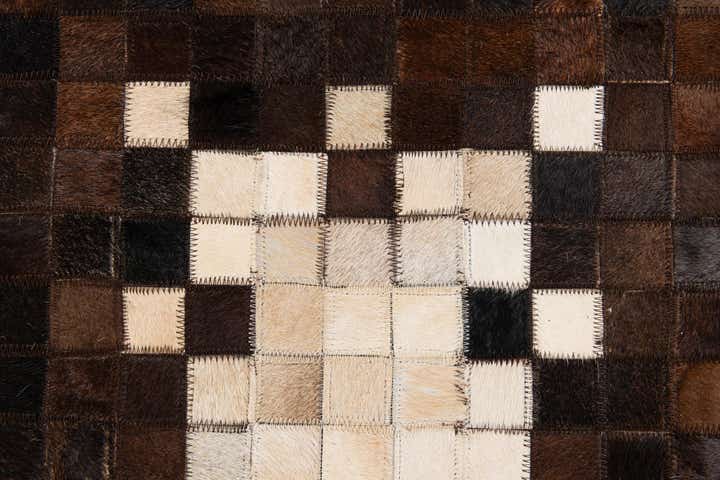 5' 1 x 8' 2 Cowhide Stocks Rug