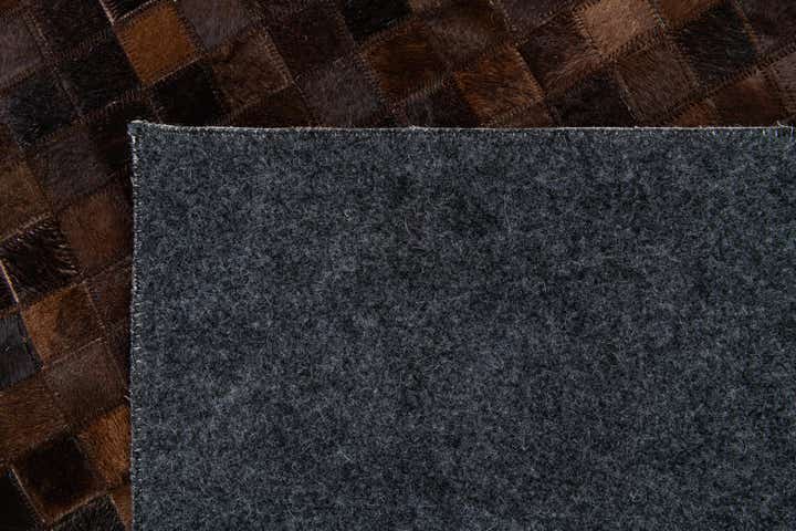 5' 1 x 8' 2 Cowhide Stocks Rug