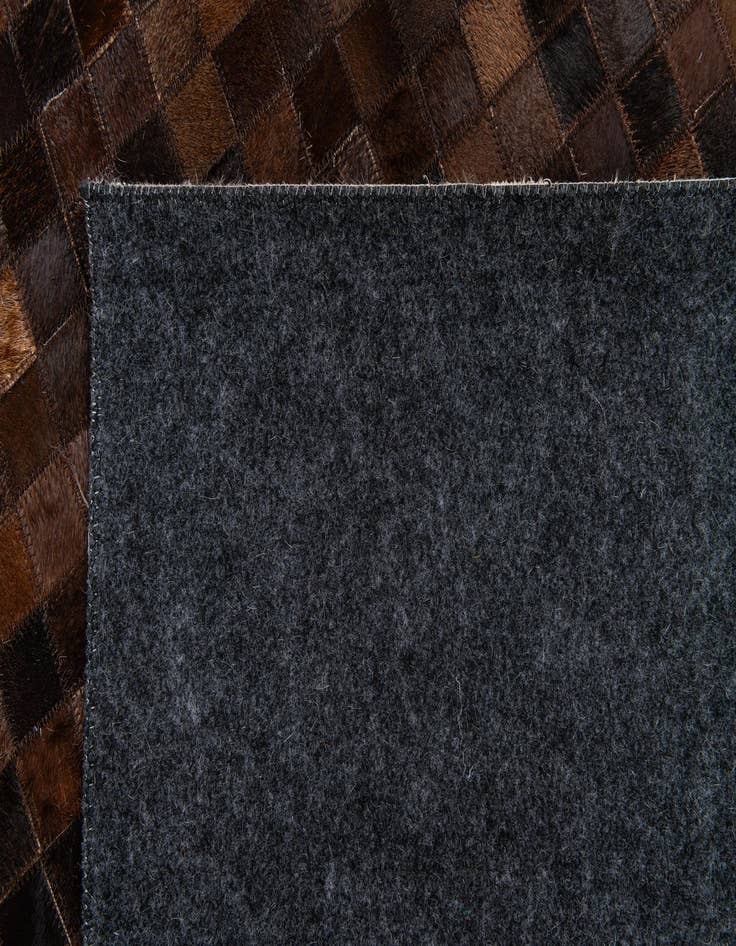 Detail image of 5' 1 x 8' Cowhide Stocks Rug
