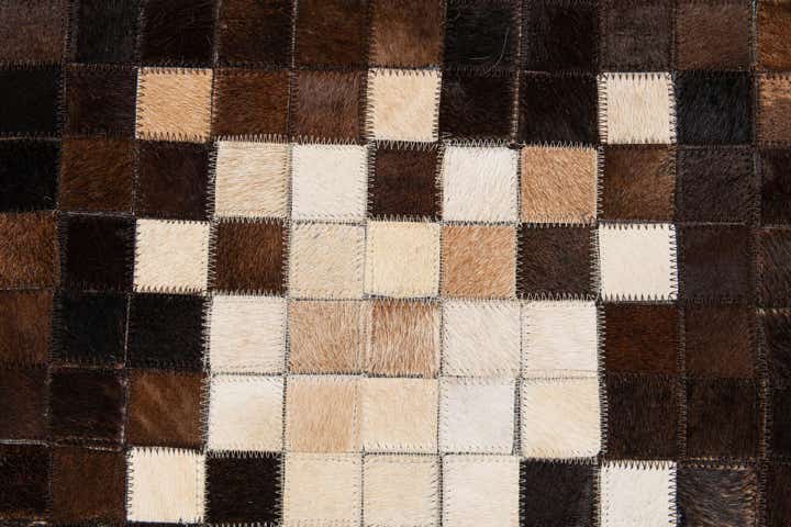 5' 3 x 8' Cowhide Stocks Rug