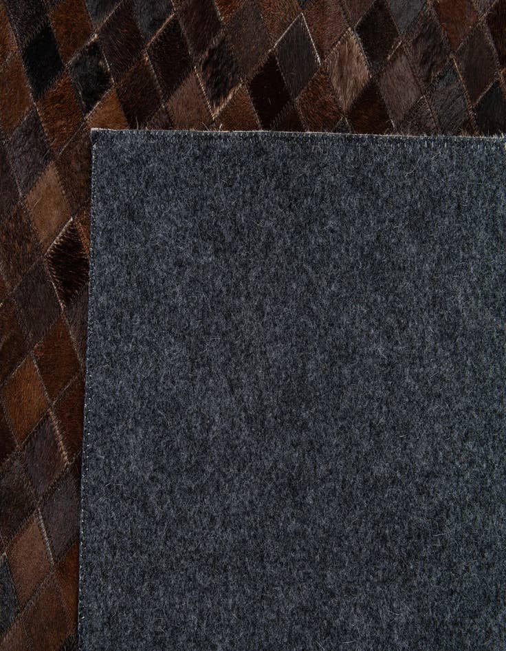 Detail image of 5' 3 x 8' Cowhide Stocks Rug