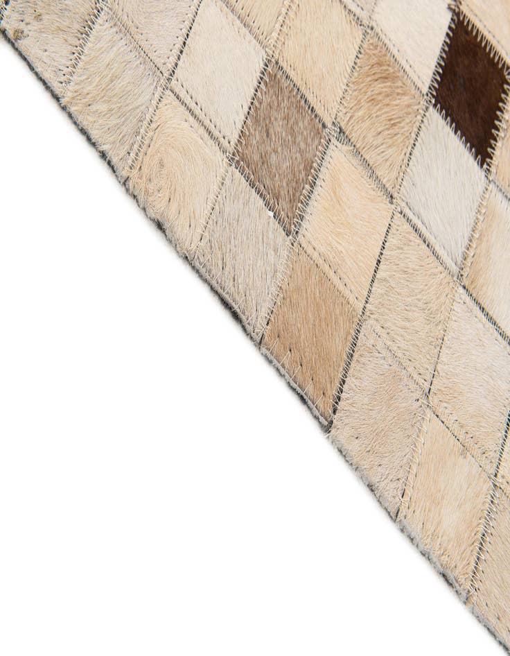 Detail image of 5' 2 x 8' Cowhide Stocks Rug