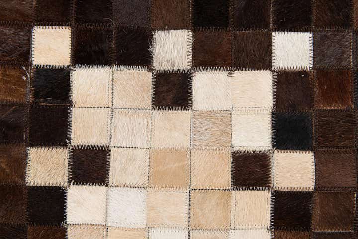5' 2 x 8' Cowhide Stocks Rug