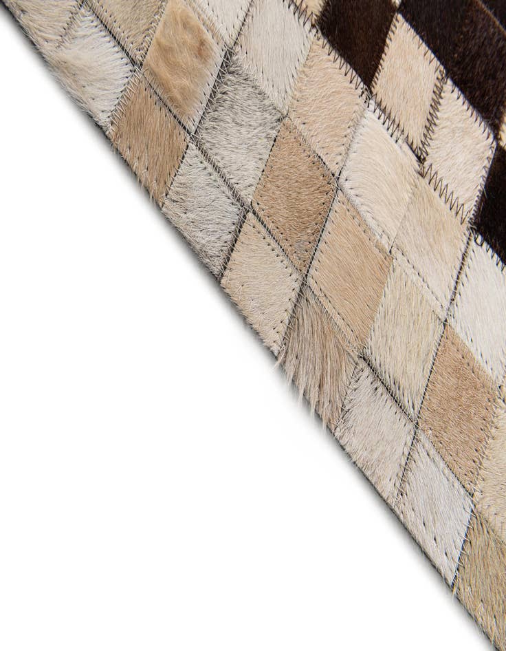 Detail image of 5' x 7' 11 Cowhide Stocks Rug