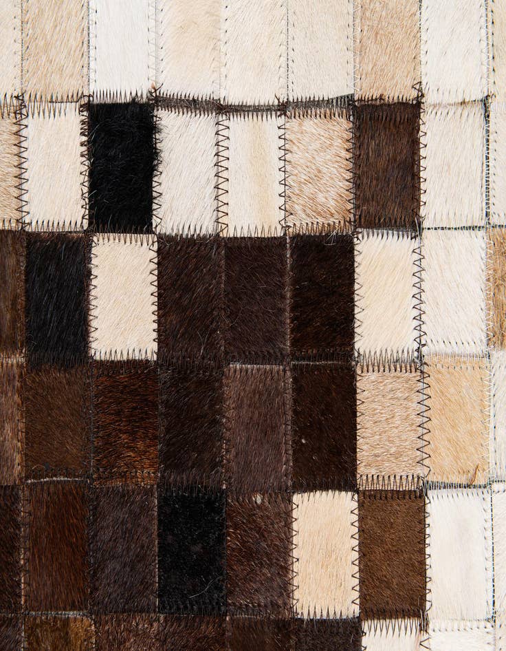 Detail image of 5' x 7' 11 Cowhide Stocks Rug