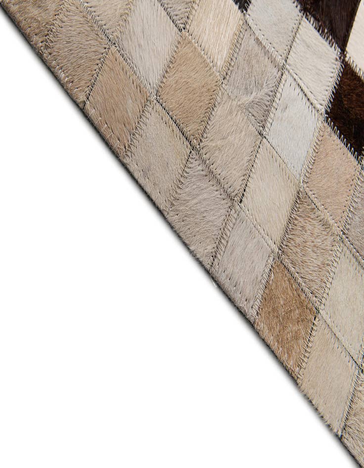 Detail image of 5' 1 x 8' 2 Cowhide Stocks Rug
