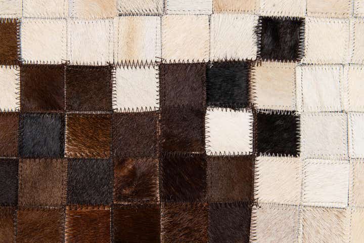 5' 1 x 8' 2 Cowhide Stocks Rug