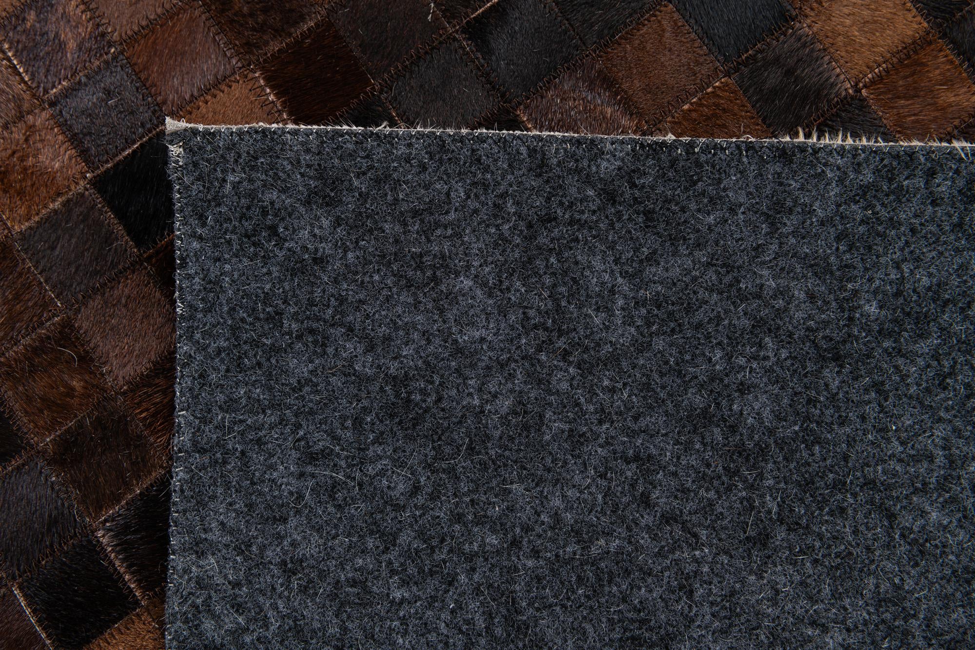 5' 1 x 8' 2 Cowhide Stocks Rug