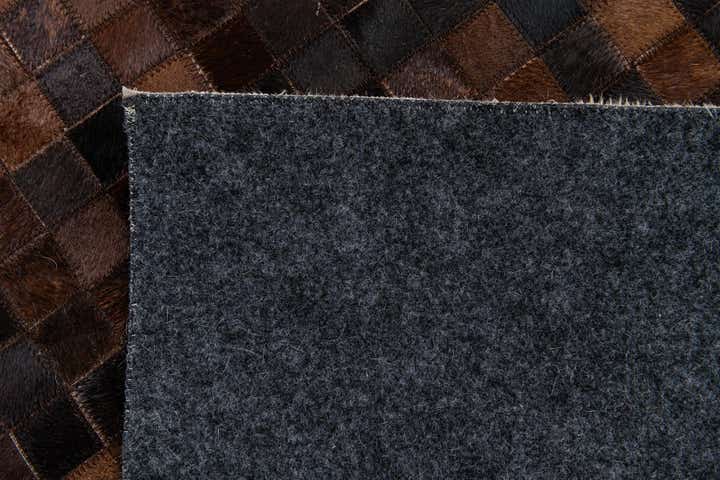 5' 1 x 8' 2 Cowhide Stocks Rug