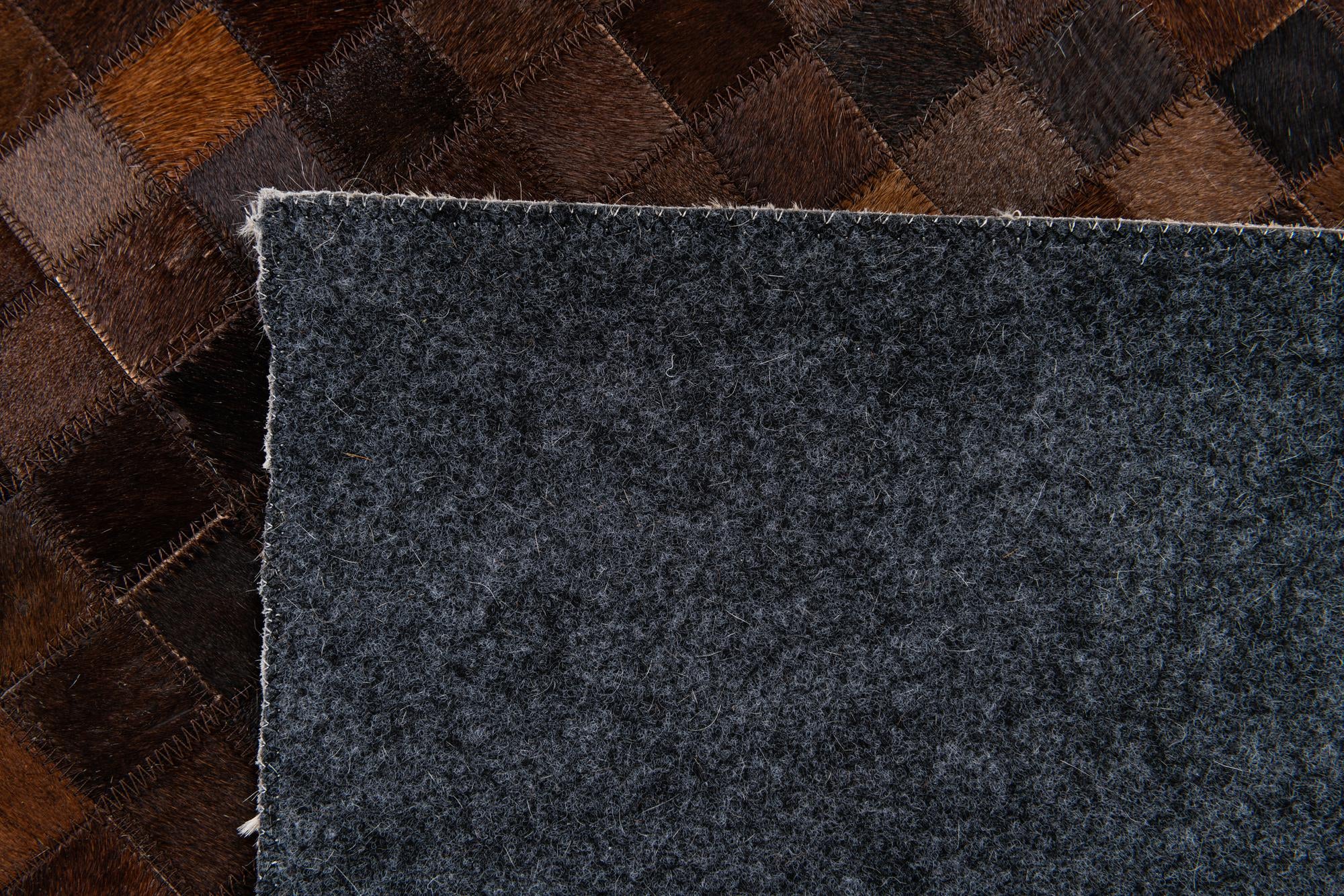 5' x 8' Cowhide Stocks Rug