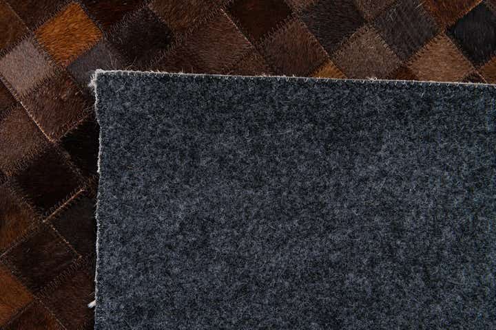 5' x 8' Cowhide Stocks Rug