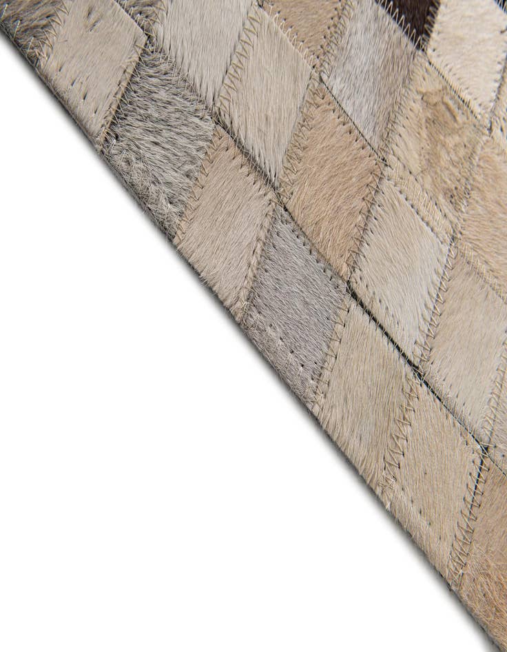 Detail image of 5' 1 x 8' 1 Cowhide Stocks Rug