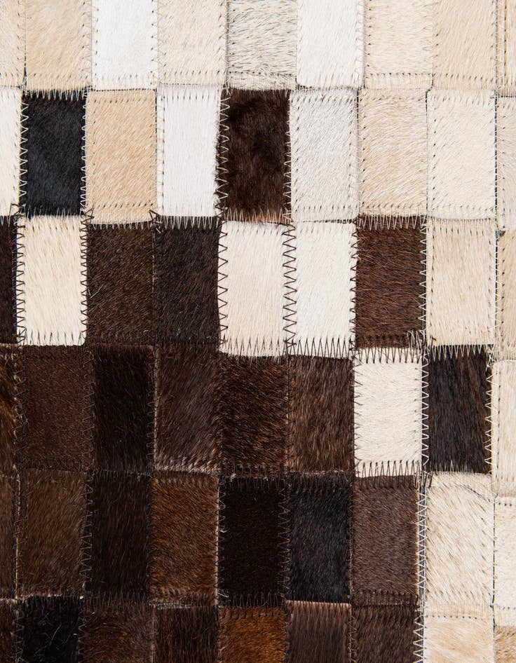 Detail image of 5' 1 x 8' 1 Cowhide Stocks Rug