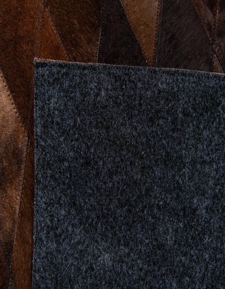 Detail image of 5' 7 x 7' 11 Cowhide Stocks Rug