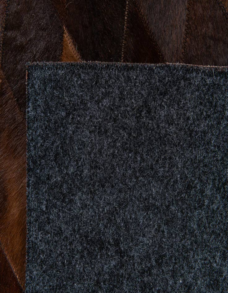Detail image of 5' 7 x 7' 11 Cowhide Stocks Rug
