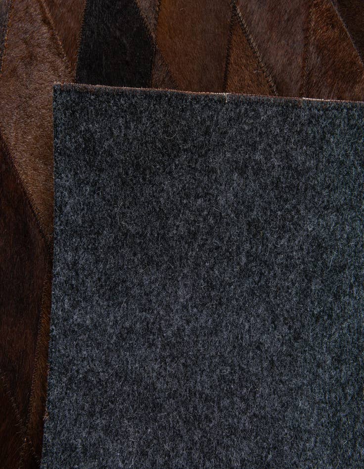 Detail image of 5' 7 x 7' 11 Cowhide Stocks Rug