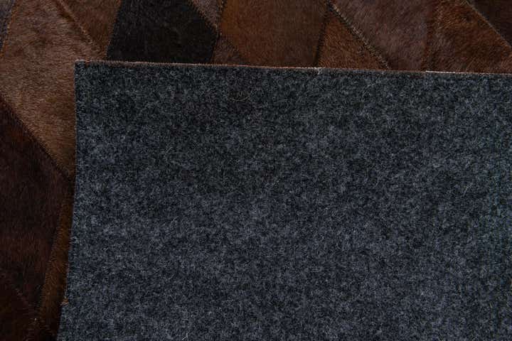 5' 7 x 7' 11 Cowhide Stocks Rug