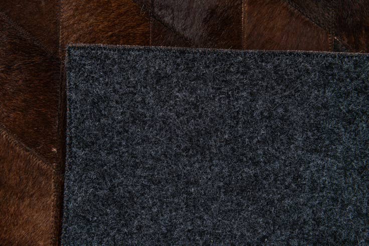 Detail image of 5' 7 x 7' 11 Cowhide Stocks Rug