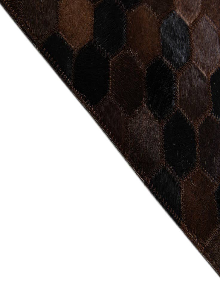 Detail image of 5' x 7' 11 Cowhide Stocks Rug