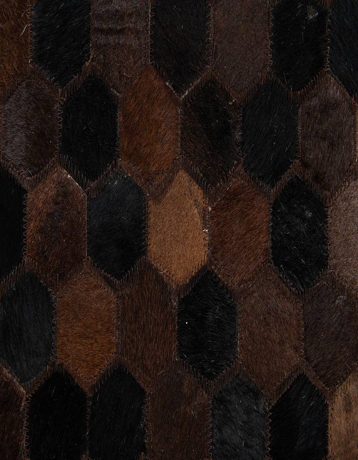 Detail image of 5' x 7' 11 Cowhide Stocks Rug
